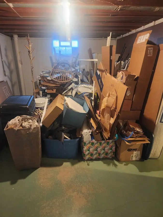 Roll-off dumpster container at job site for 2 Yard Dumpster Rental in Chadron